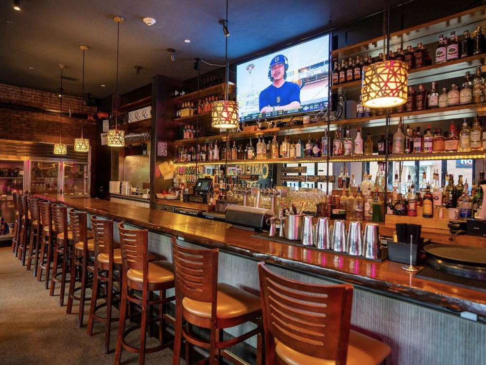 the bar with TV screen at Carter's Restaurant and Lounge in Beacon NY