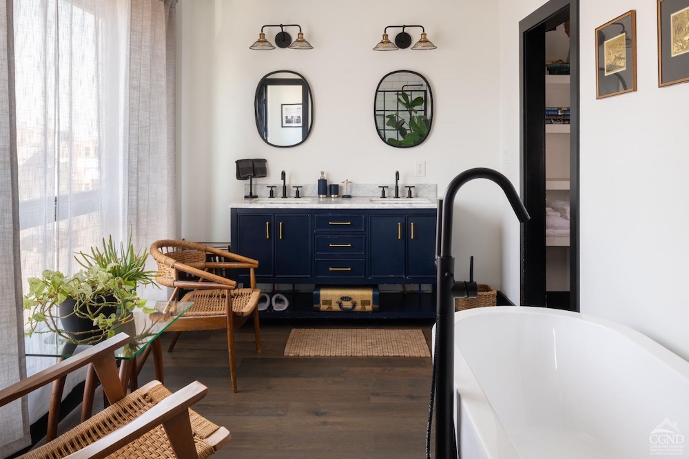 full bathroom Just off the kitchen, a mudroom with herringbone brick flooring leads to the backyard and includes a convenient half bath.