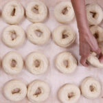 Beth George's hands shaping bagels at Bagel-ish in Beacon, NY.