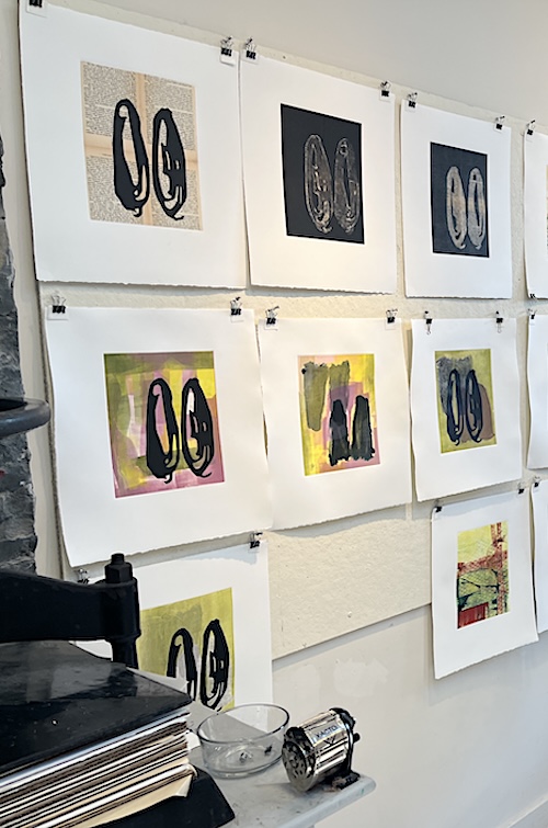 Art on wall for the 2025 Woodstock School of Art Monoprint Invitational Exhibition and Auction