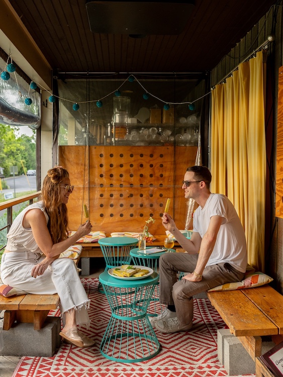 two people hanging out on the patio at Jar'd in New Paltz NY