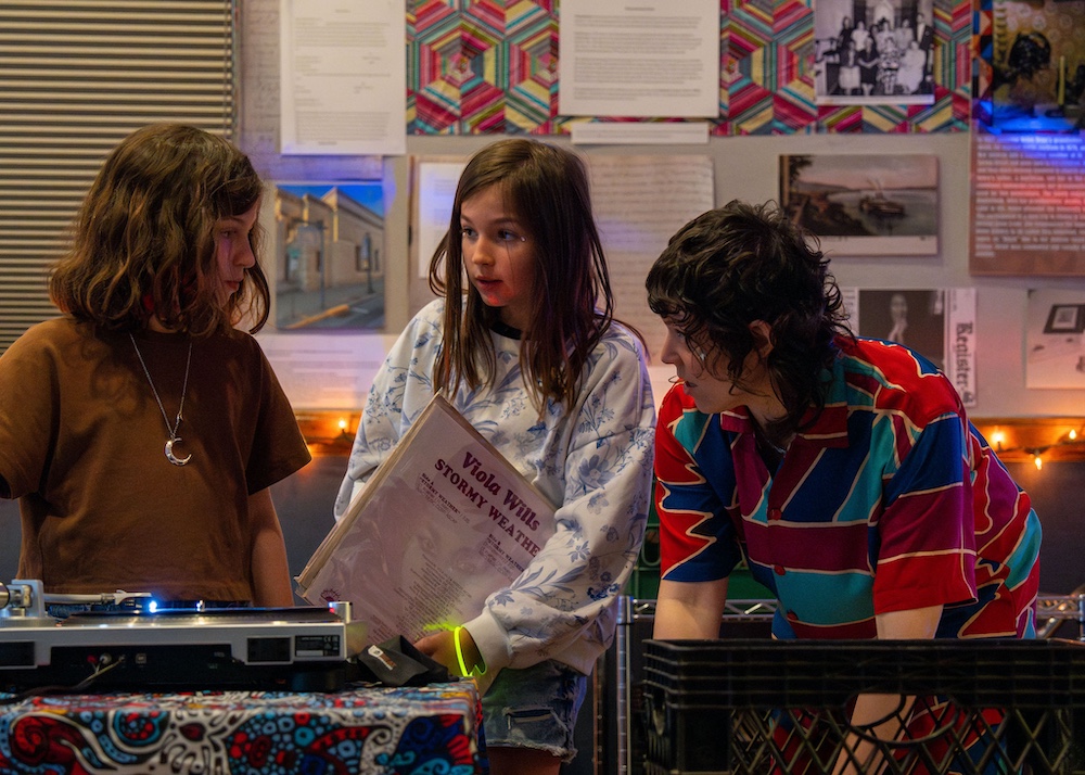 DJ Sarah van Buren teaching kids how to DJ