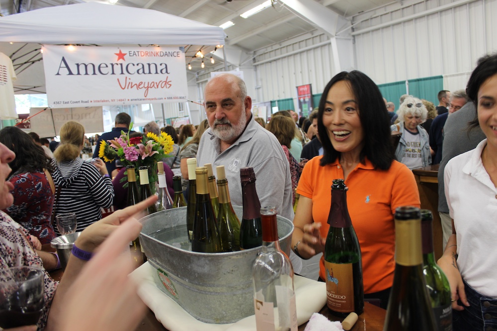 interacting with vendors at Hudson Valley Wine & Food Festival in Rhinebeck NY