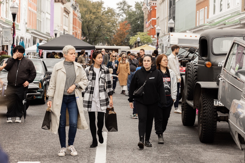 people walking around and looking at classic cars at StockadeFaire 2025 in Uptown Kingston NY's Historic Stockade District