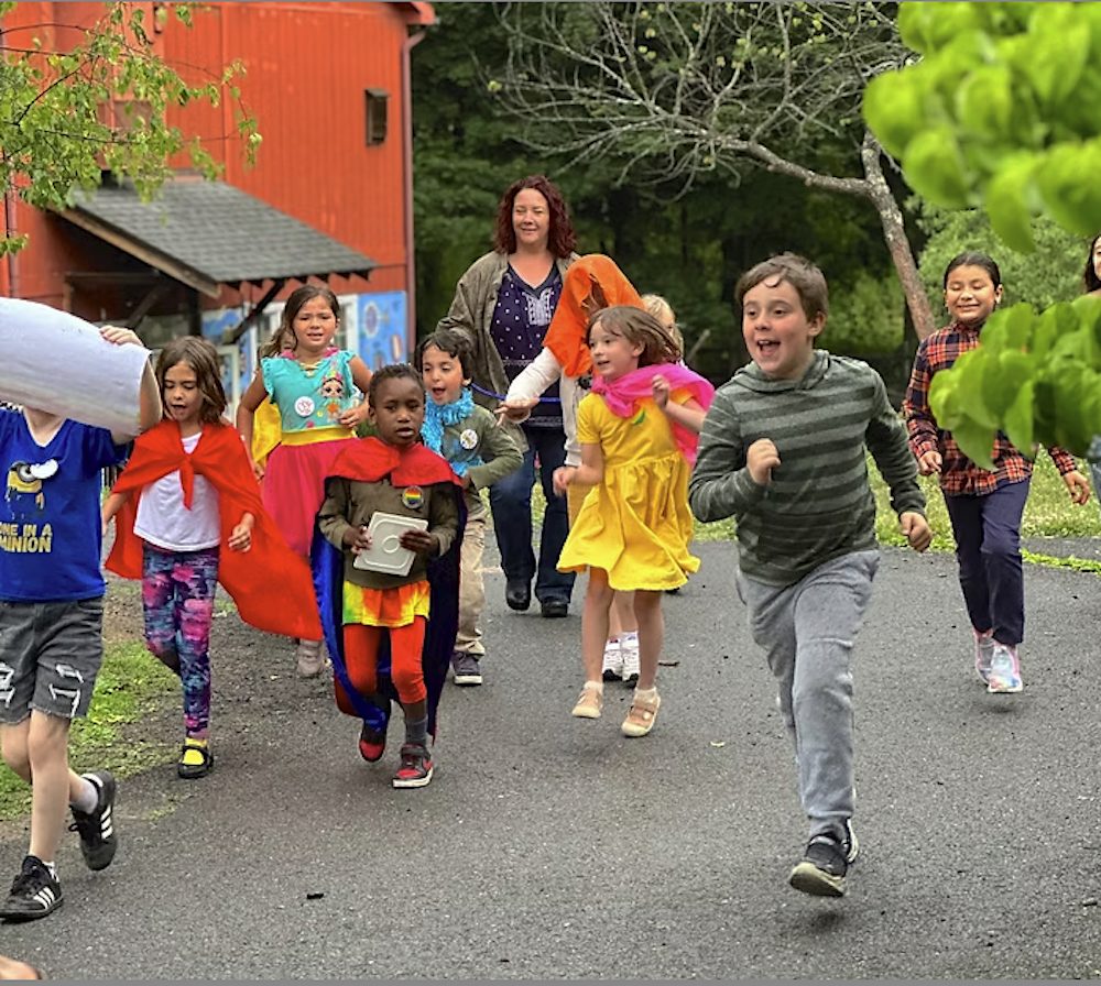 kids running in costumes at High Meadow School in Stone Ridge NY
