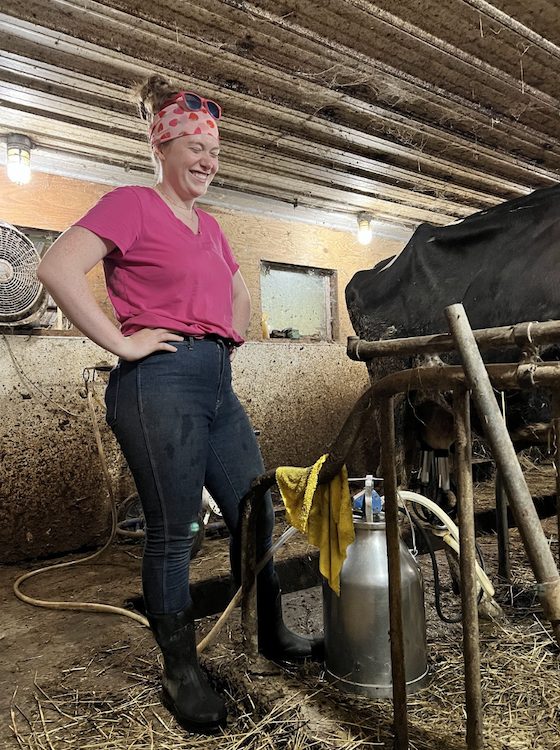 intern Charolette milking cows at the Hilltop Farm in Accord NY
