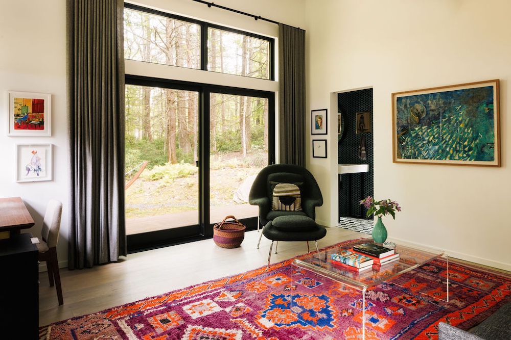 corner living room by Designer Kate Cummings who reimagines the "She-Shed" in Kerhonkson NY