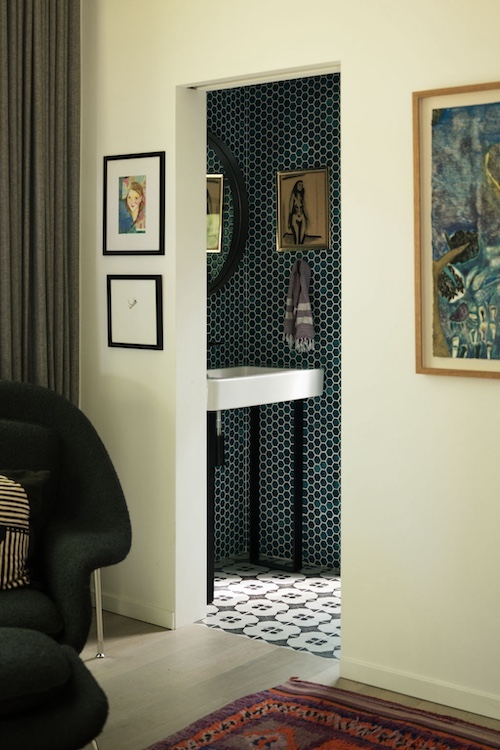 doorway to bathroom by Designer Kate Cummings who reimagines the "She-Shed" in Kerhonkson NY