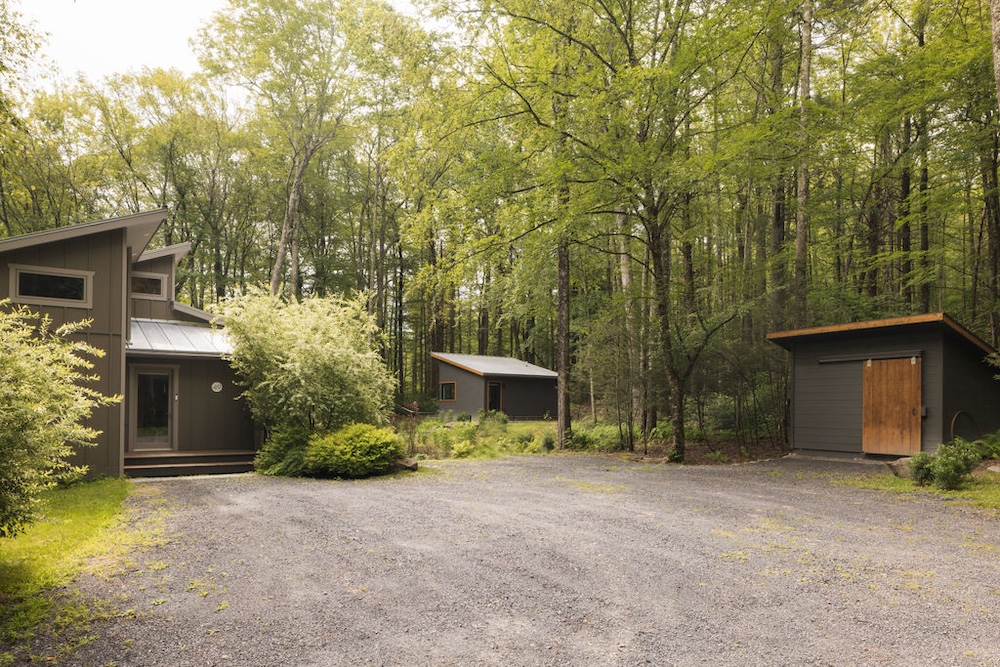 parking driveway view of house and She-Shed by Designer Kate Cummings who reimagines the "She-Shed" in Kerhonkson NY