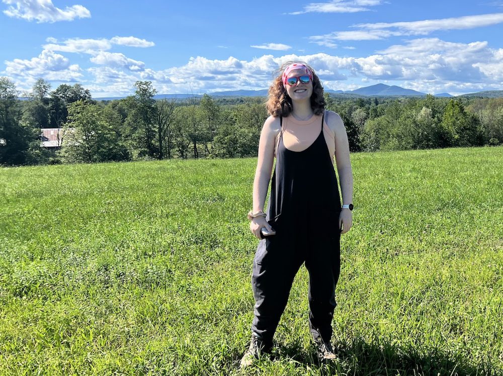 Intern Charlotte in the field at the Hilltop Farm in Accord NY