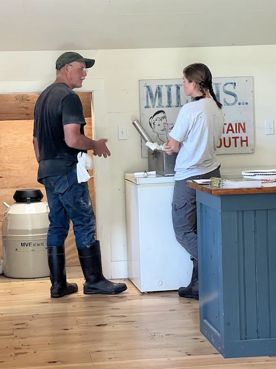 Farmer Barton mentoring intern Viola at the Hilltop Farm in Accord NY