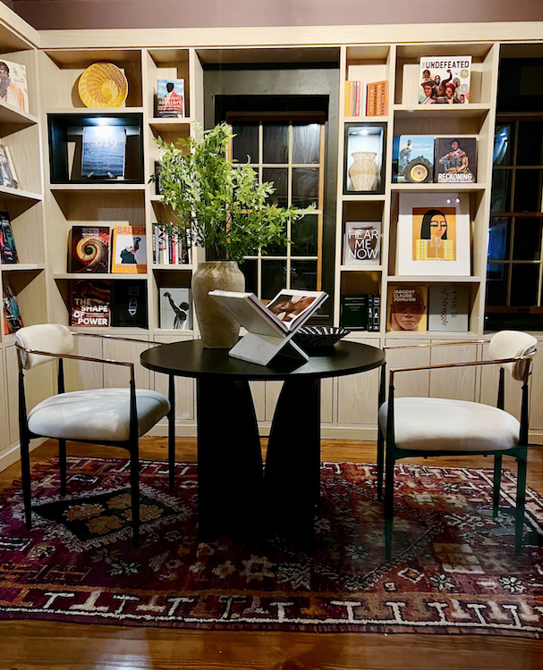 Table and chairs in the Be Free Library designed by Aphrochic for the 2025 Kingston Design Showhouse.