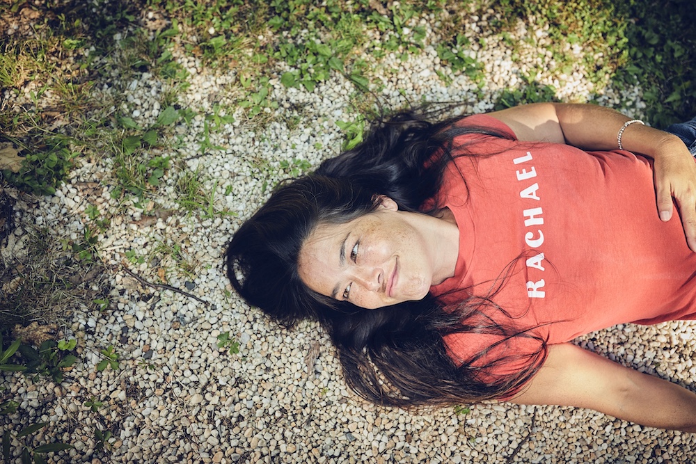 Rachael Yamagata laying down on the ground