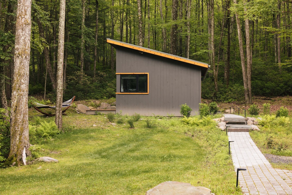 exterior side view by Designer Kate Cummings who reimagines the "She-Shed" in Kerhonkson NY