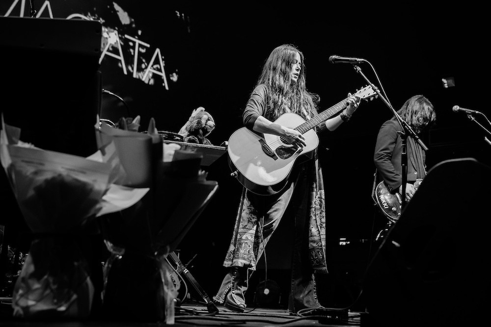 Rachael Yamagata on stage performing