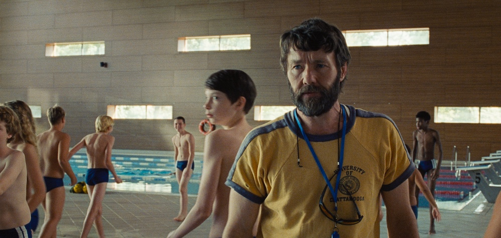 coach at pool in movie The Plague