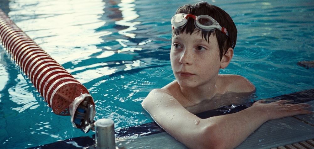 boy in the pool in the movie The Plague