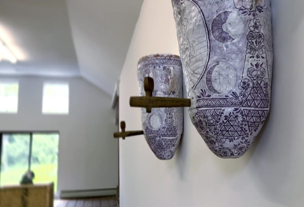 Clay Vessels with spigots on wall by sculptor Nicki Green, Kingston, NY.
