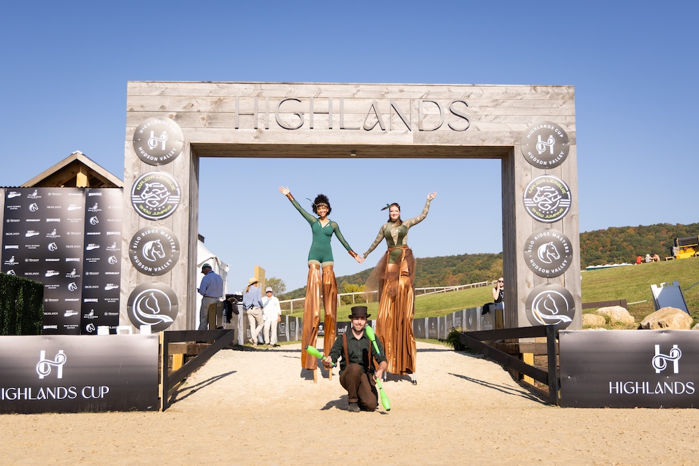 Welcome arch with people on stilts at Silo Ridge Masters CSI3 Grand Prix at The Highlands Stud Farm in Amenia NY