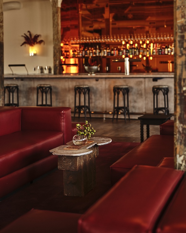 red satin and wood bar booths at Pocketbook Hudson in Hudson NY