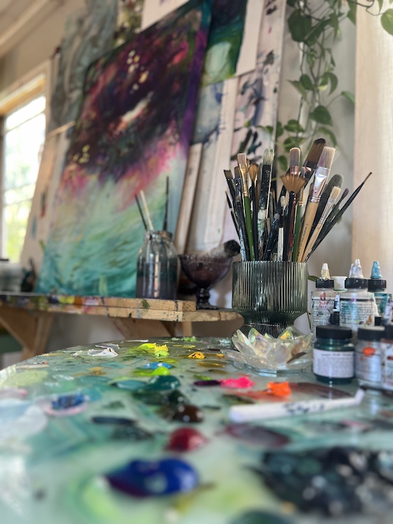 brushes and paints in her studio by Artist Tara Bach in Saugerties NY