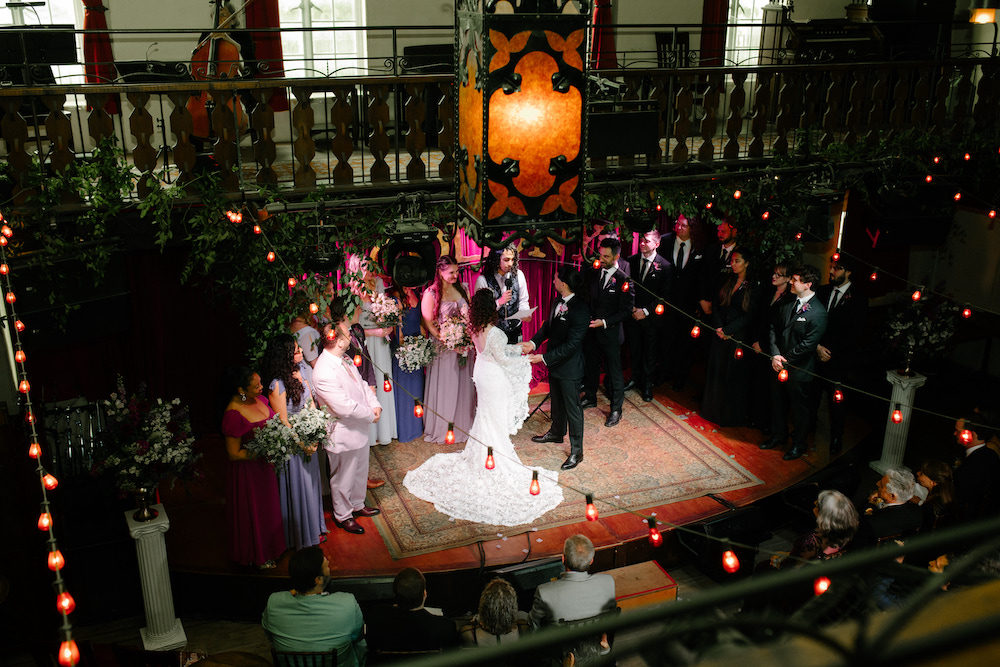 Sarah Seeds and Michael Pizzano share wedding vows at The Colony Woodstock.