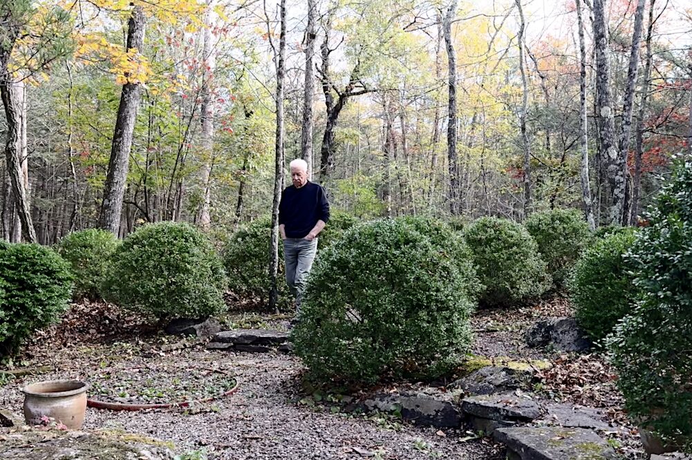 Artist Donald Elder in his garden