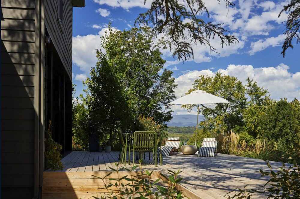 view of deck, chairs and mountain at 44 Main Street, Germantown NY