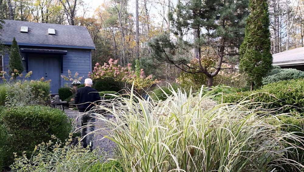 Artist Donald Elder walking to his studio