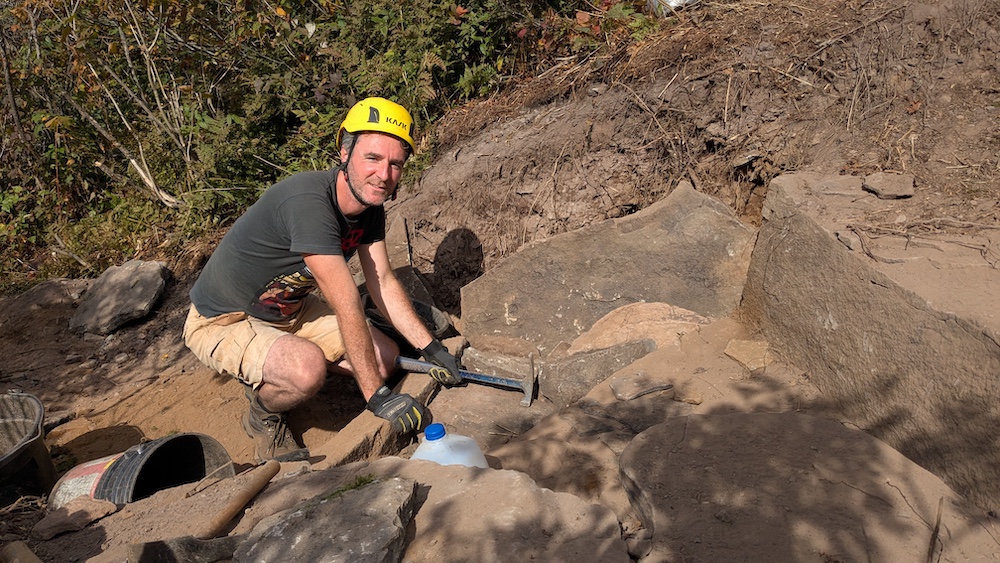 Paul Willis working on a hiking trail up on the side of a mountain in the Catskills NY