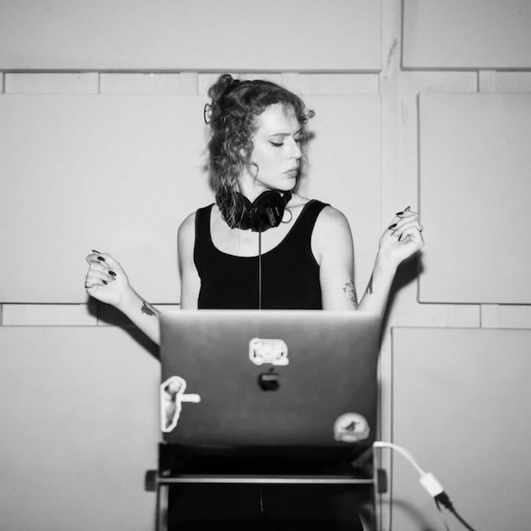 DJ MK Ultramatic playing music from her computer