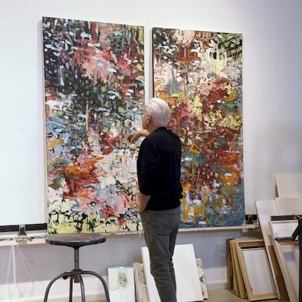 Don Elder abstract artist looking at painting