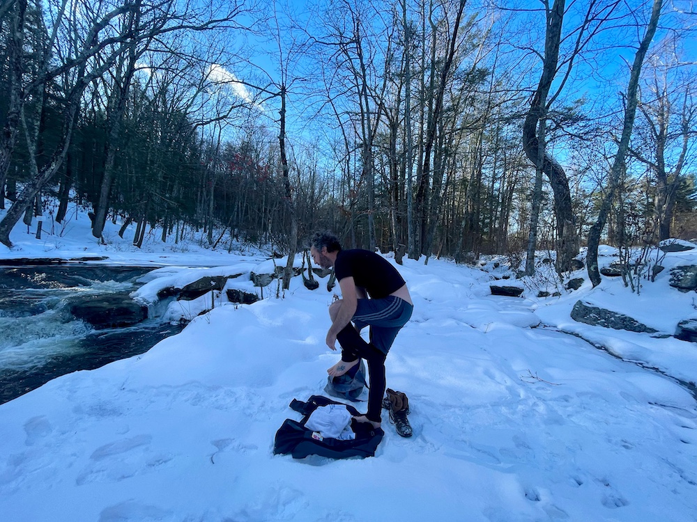 undressing for a Polar Bear Plunge into Peter's Kill in the Minnewaska State Park Preserve, NY