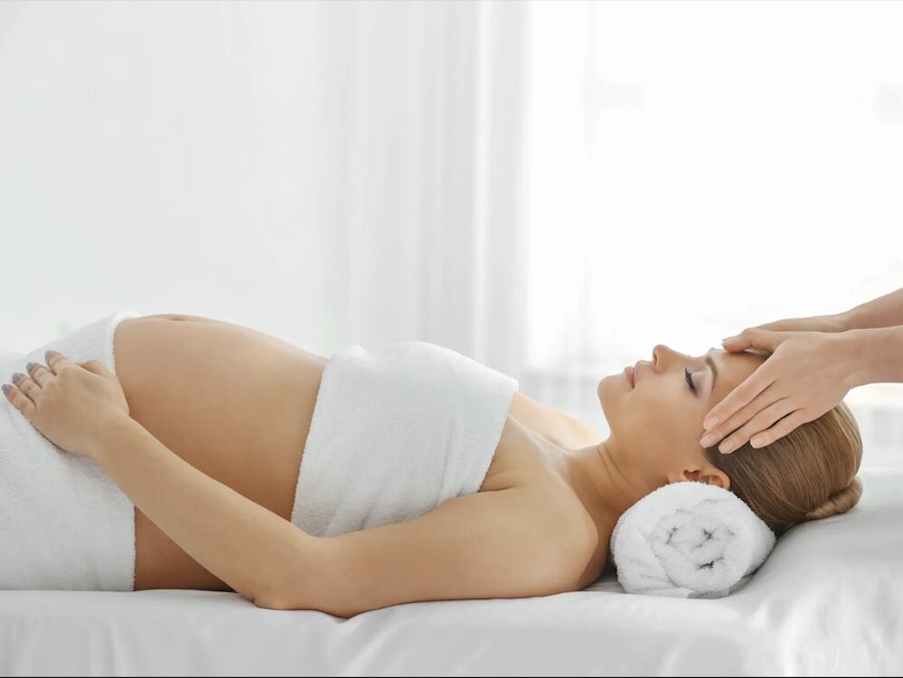 pregnant woman getting a massage at the Dutchess Hotel Spa in Beacon NY
