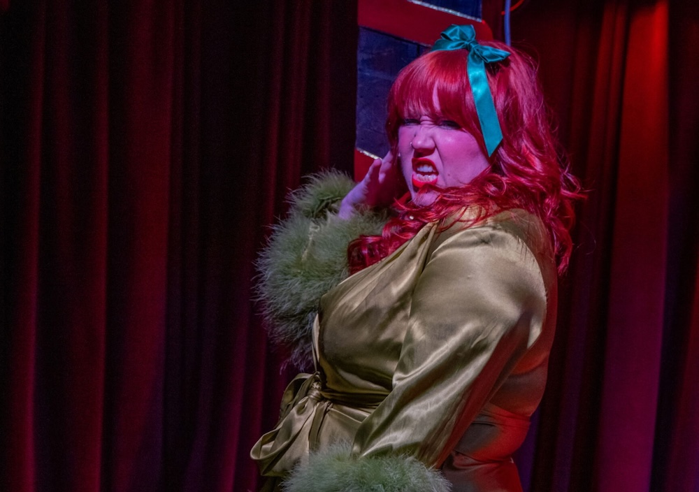 Ginger Marschino on stage peforming photo by John Huntington