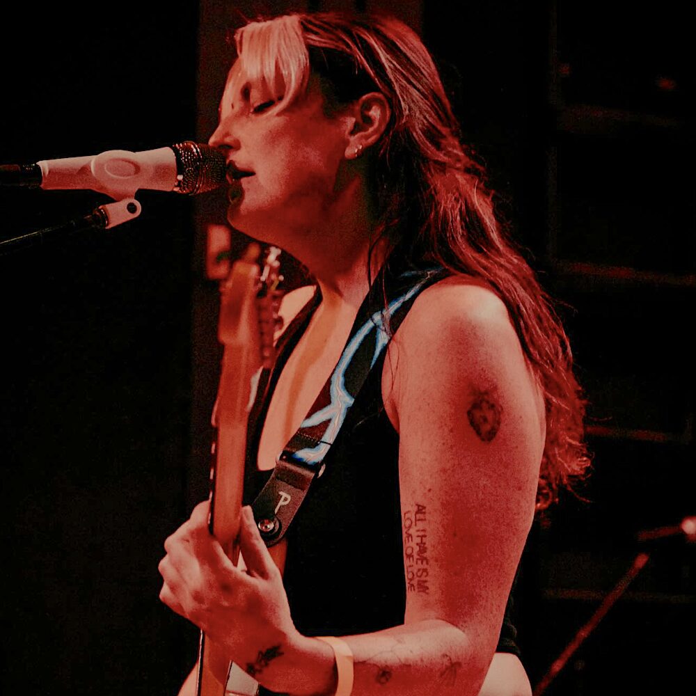 Hudson Valley musician Aubrey Haddard performing on stage