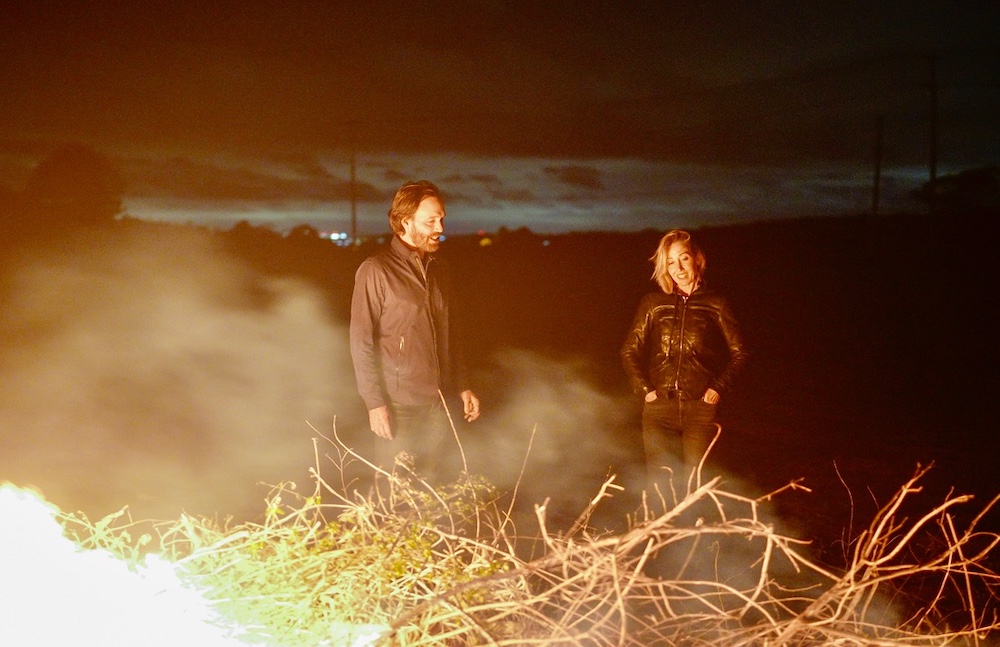 Matt Pond PA and Anya Marina at night near a bonfire