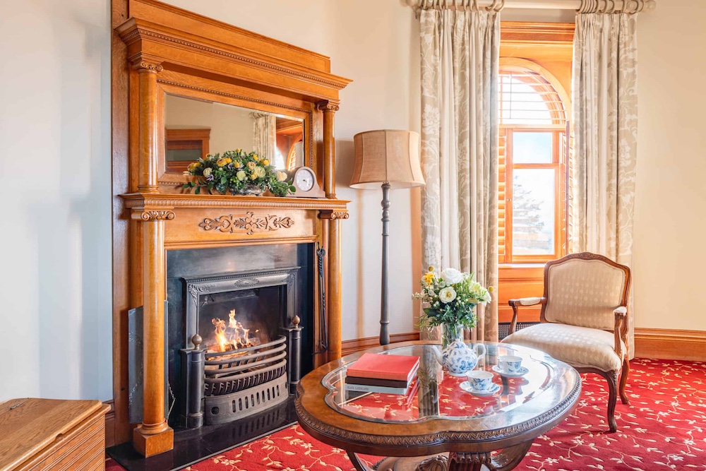 fireplace in the bedroom suite at Mohonk Mountain House in New Paltz NY