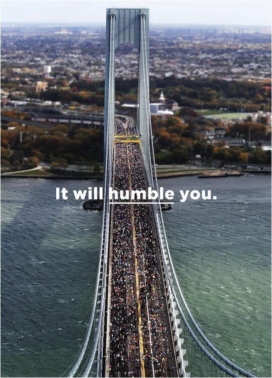 NYC 50th Marathon cover shot with photo of massive amounts of people running over the bridge