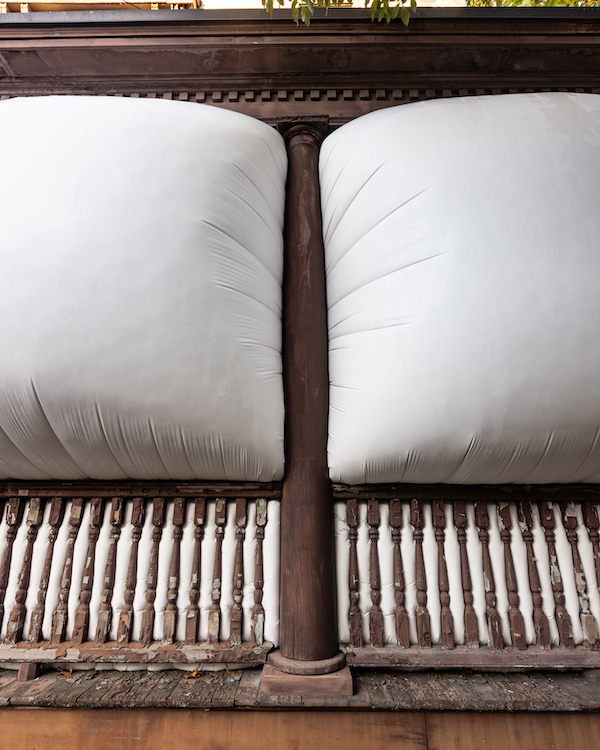 Portico - Plaster, wood, porch Photos by Joshua Simpson