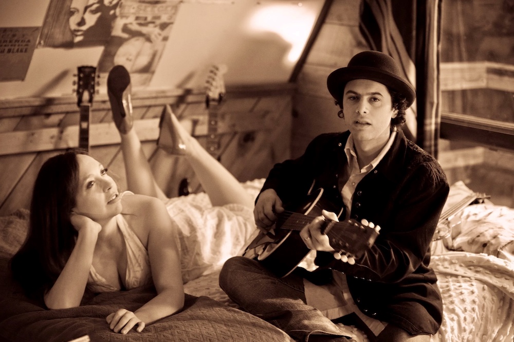 Ruthy Ungar + Mike Merenda on a bedspread