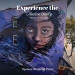 Mural in Kingston NY of a Sudanese Poet created by Jess X Snow with the "Experience the Hudson Valley" and "Upstate Weekend Plans" text written across the Hudson Valley, NY photo this the upcoming weekend dates.