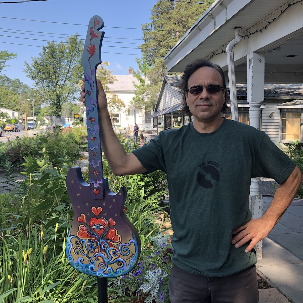 Mike Dubois with his painted Guitar