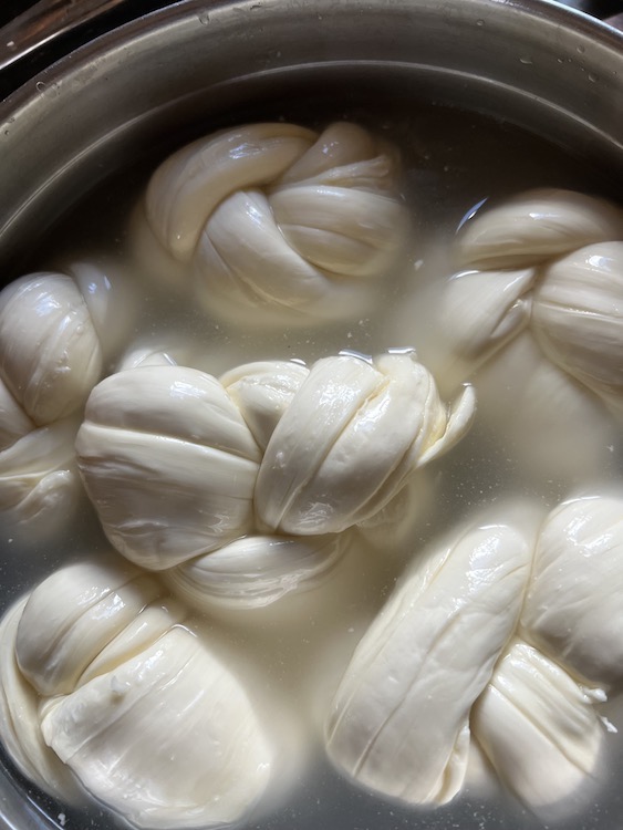 Becky's Mozzarella cheese in the brining stage.