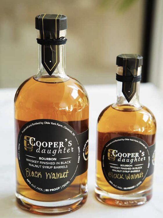 two bottles of black walnut spirits by Cooper’s Daughter Distillery in Claverack NY