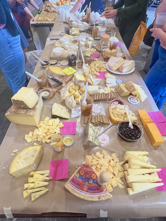Table of cheese at a gathering of the MilkMaids in New York State.