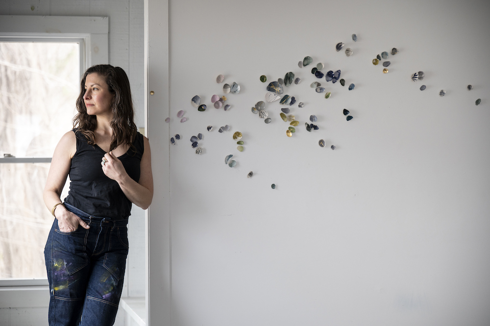 Hudson Valley Artist Elisa Sheehan next to one of her installations.