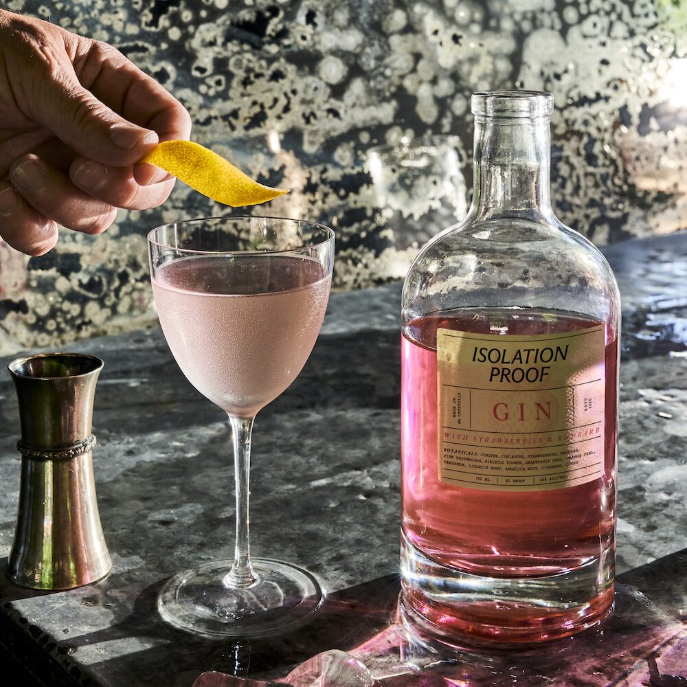 Isolation Proof gin cocktail and bottle 