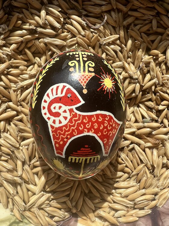 painted egg of a red ram for the Pysanky Workshop for Ukraine by Sasha Botanica