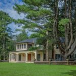 wolf tree next to a building on the Spacious, Refined Interiors Property in Warsing, Ulster County NY